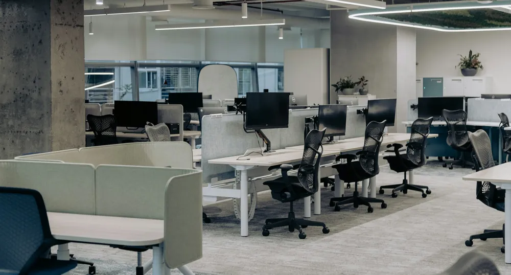 Bright, clean open-plan office with workstations