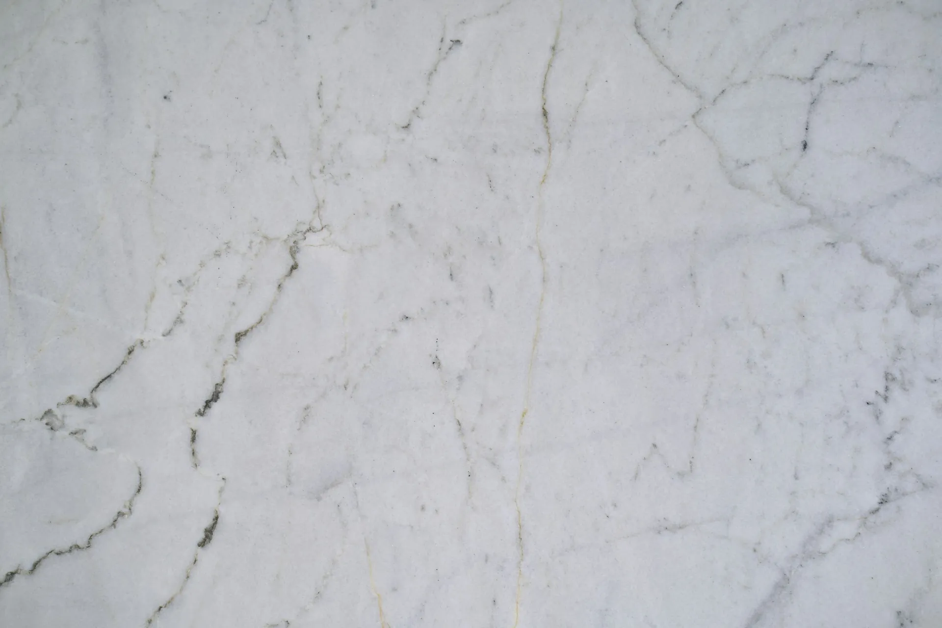 White marble surface with soft grey veining