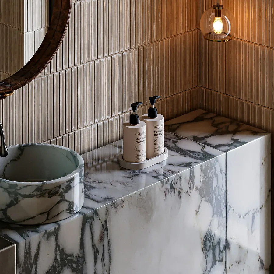 Polished marble counter with a basin and natural textures