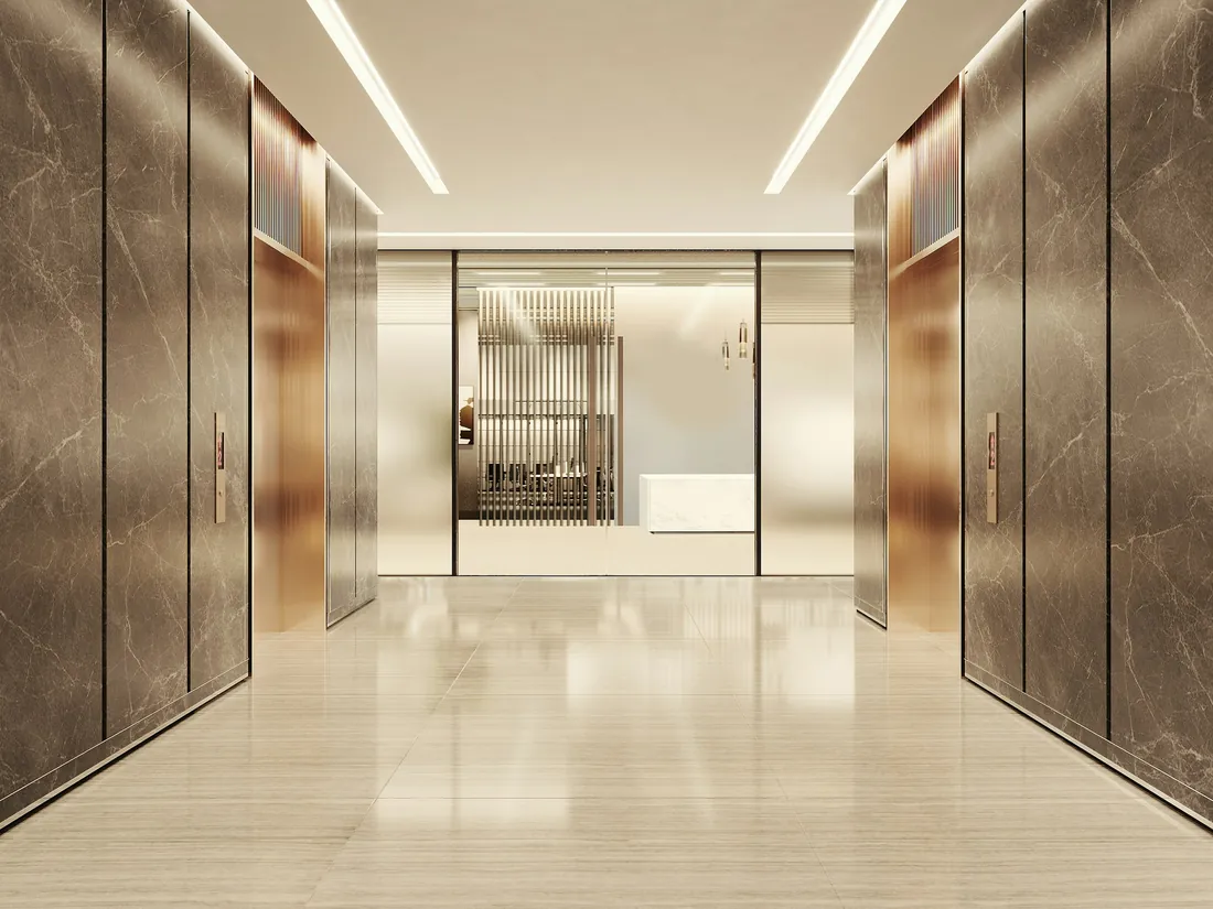 Polished marble elevator lobby in a modern commercial building